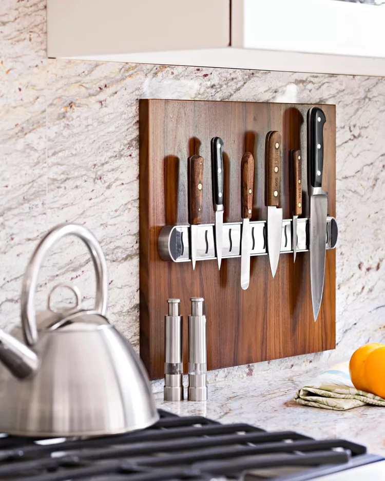 knife hanging on wall mounted storage in kitchen
