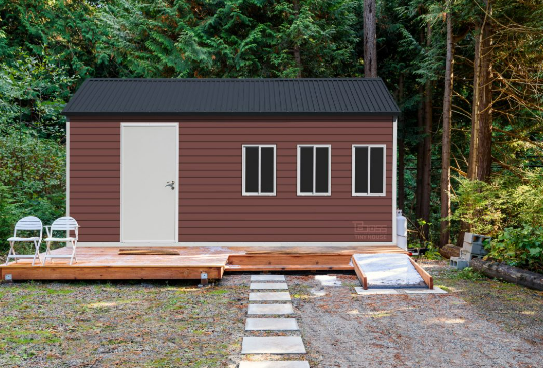 red color tiny home in the middle of forest